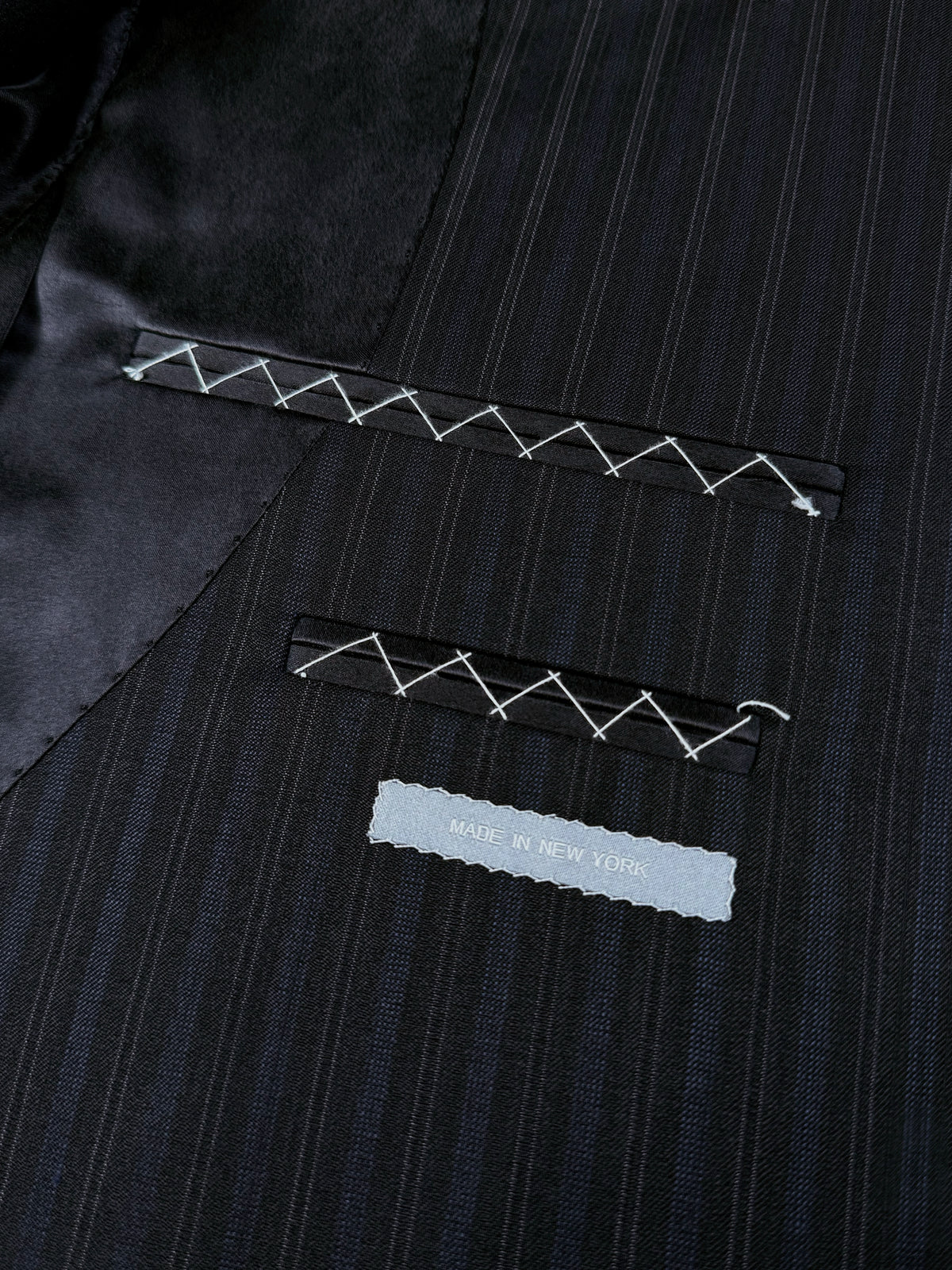 BLACK WITH FAINT BLUE STRIPES WORSTED WOOL AND SILK SUIT
