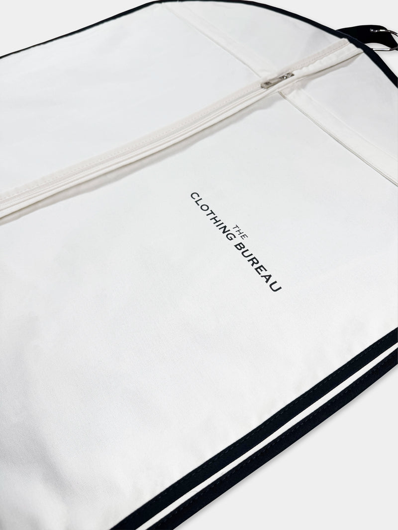 THE BUREAU COTTON GARMENT BAG IN IVORY AND JET BLACK