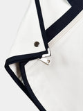 THE BUREAU COTTON GARMENT BAG IN IVORY AND JET BLACK