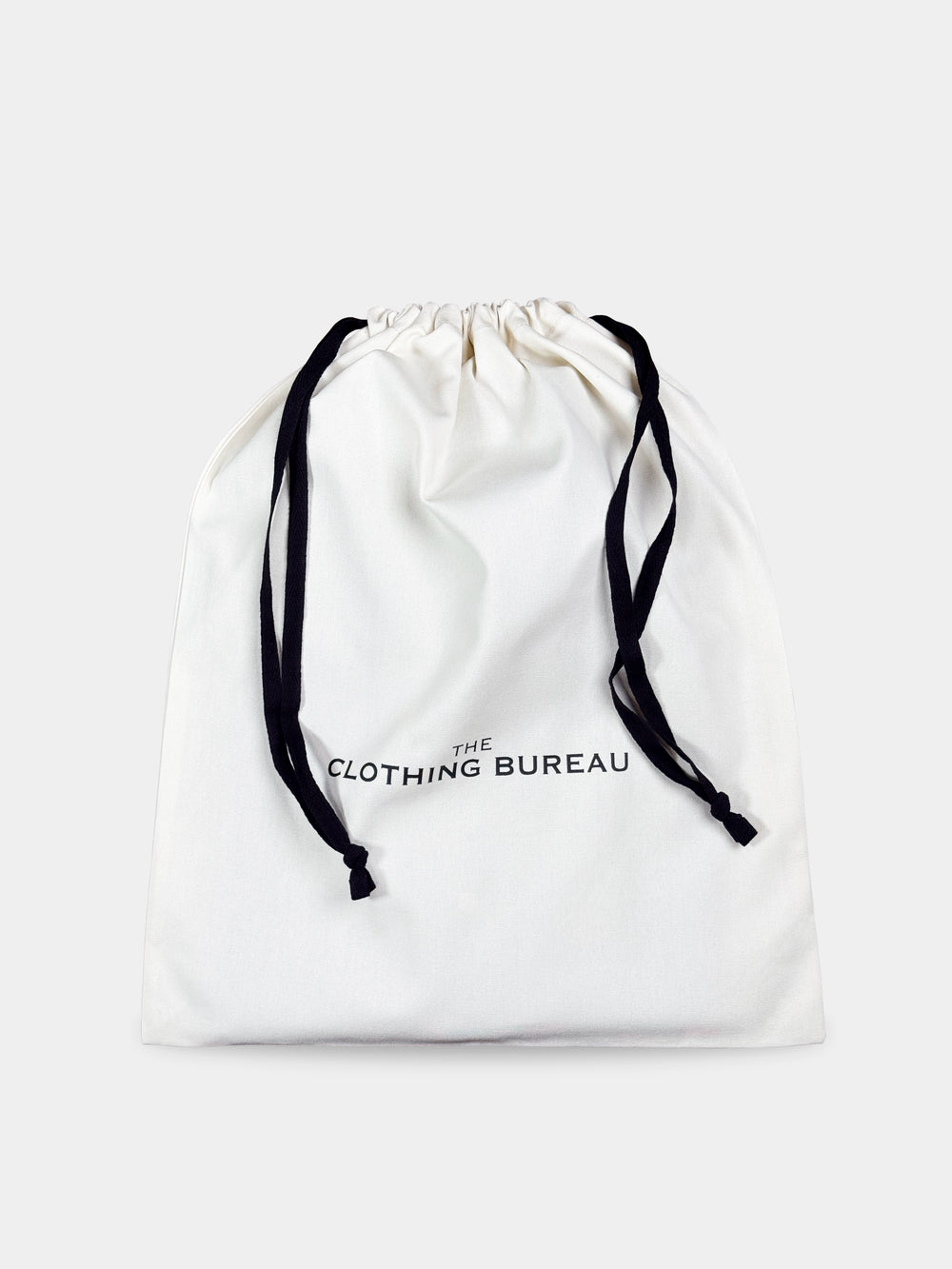 The Clothing Bureau cotton pouch with black drawstrings, closed