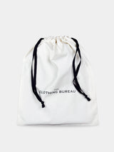 The Clothing Bureau cotton pouch with black drawstrings, closed